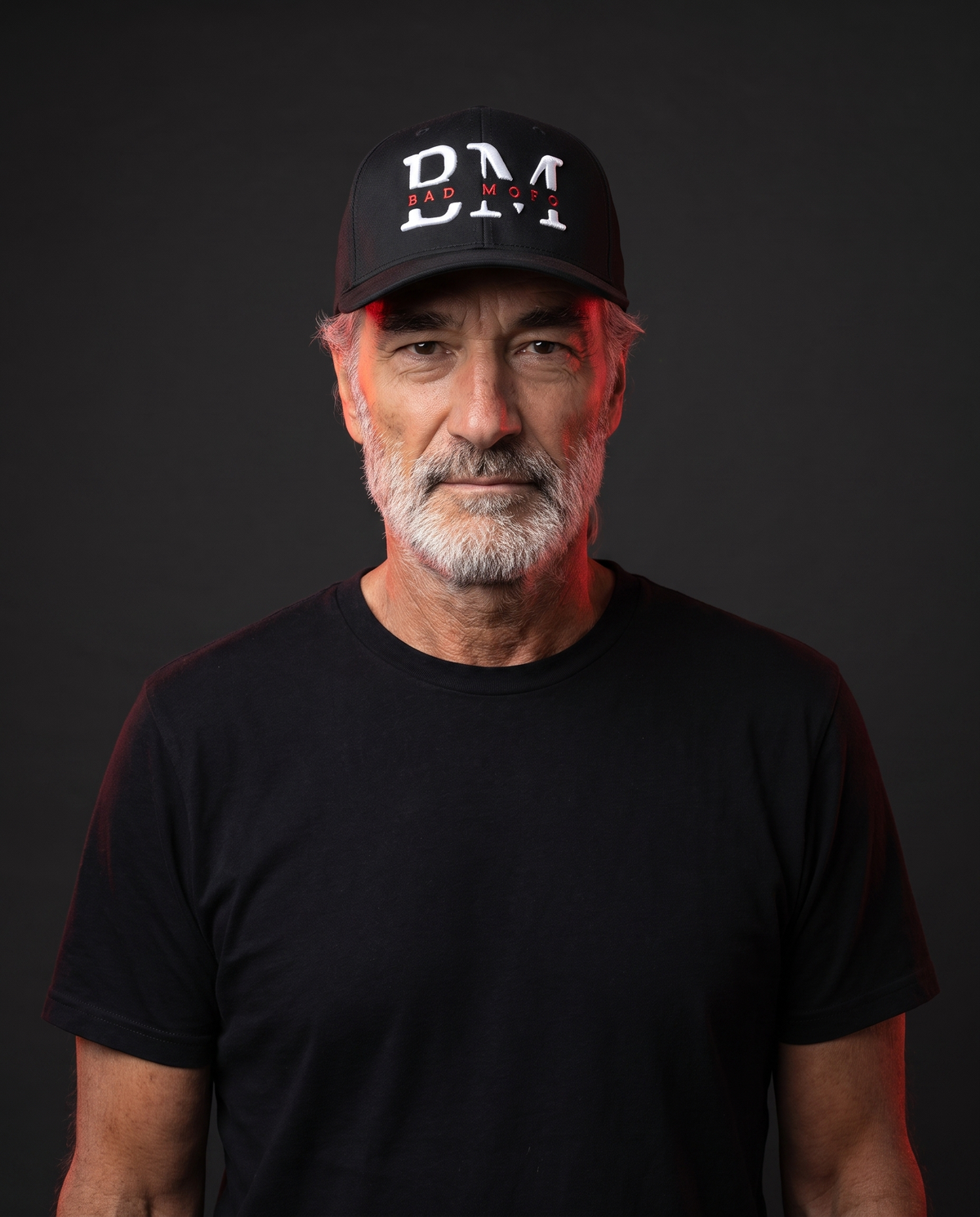 Black BM fitted hat on model - studio