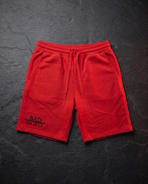 Red shorts - dark studio